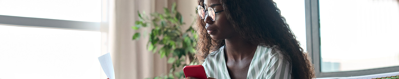 A woman reviewing her credit report online