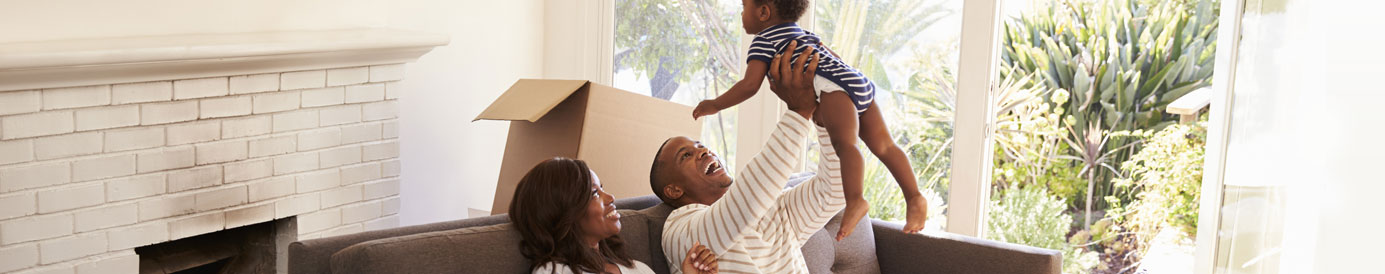 A family sitting in their new house