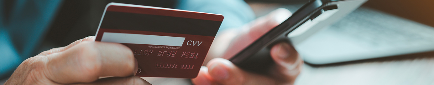 A person paying their credit card bill on their phone