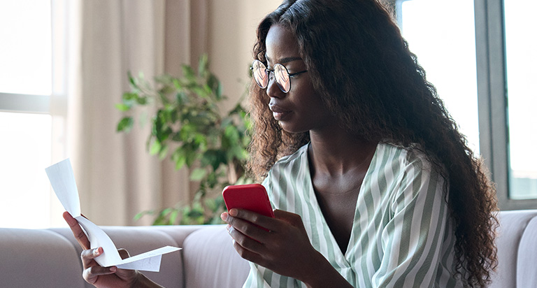 A woman reviewing her credit report online